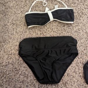 Two large bikinis floral pattern solid great condition. Worn a couple times